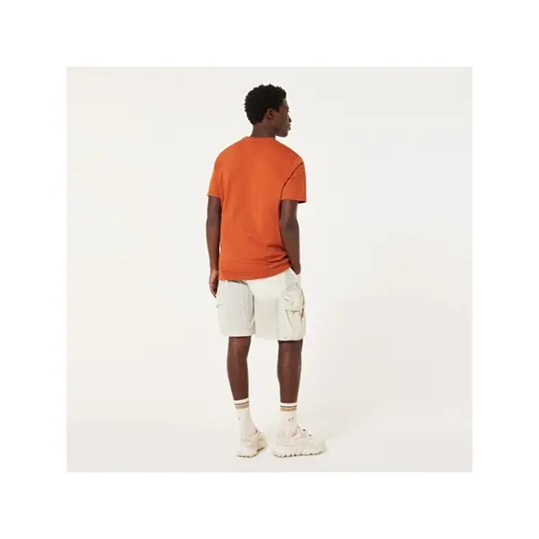 חולצה קצרה אוקלי כתום OAKLEY O BARK 2.0 דוגמן מאחורה מסתכל ימינה