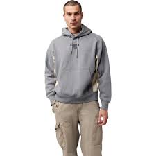 קפוצ׳ון Fox Moto-X Oversized FLC PO מבט קדמי תקריב על לוגו FOX MOTO-X בחזית מבט צד על גזרה Oversized רחבה מבט אחורי על קפוצ׳ון Fox עם כובע ושרוך מתכוונן